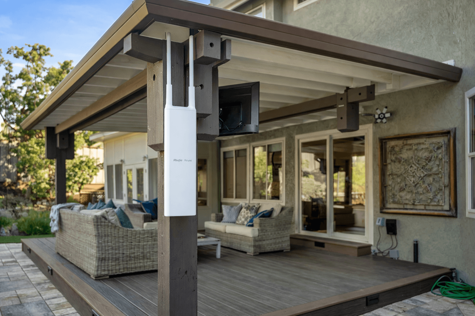 Outdoor WiFi coverage in a backyard patio area with Starlink internet