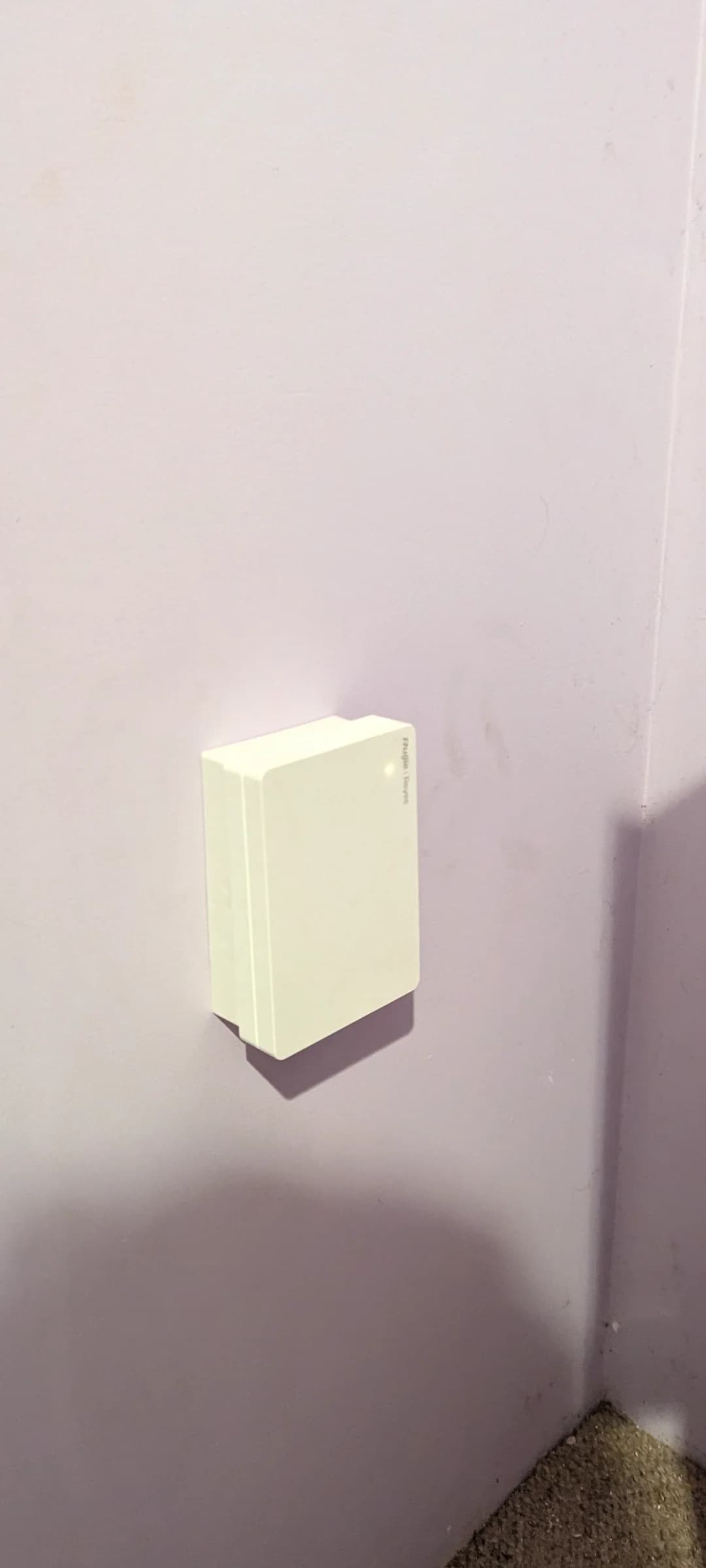 Discreet wall-mounted Wi-Fi access point installed by Blake Smart Solutions