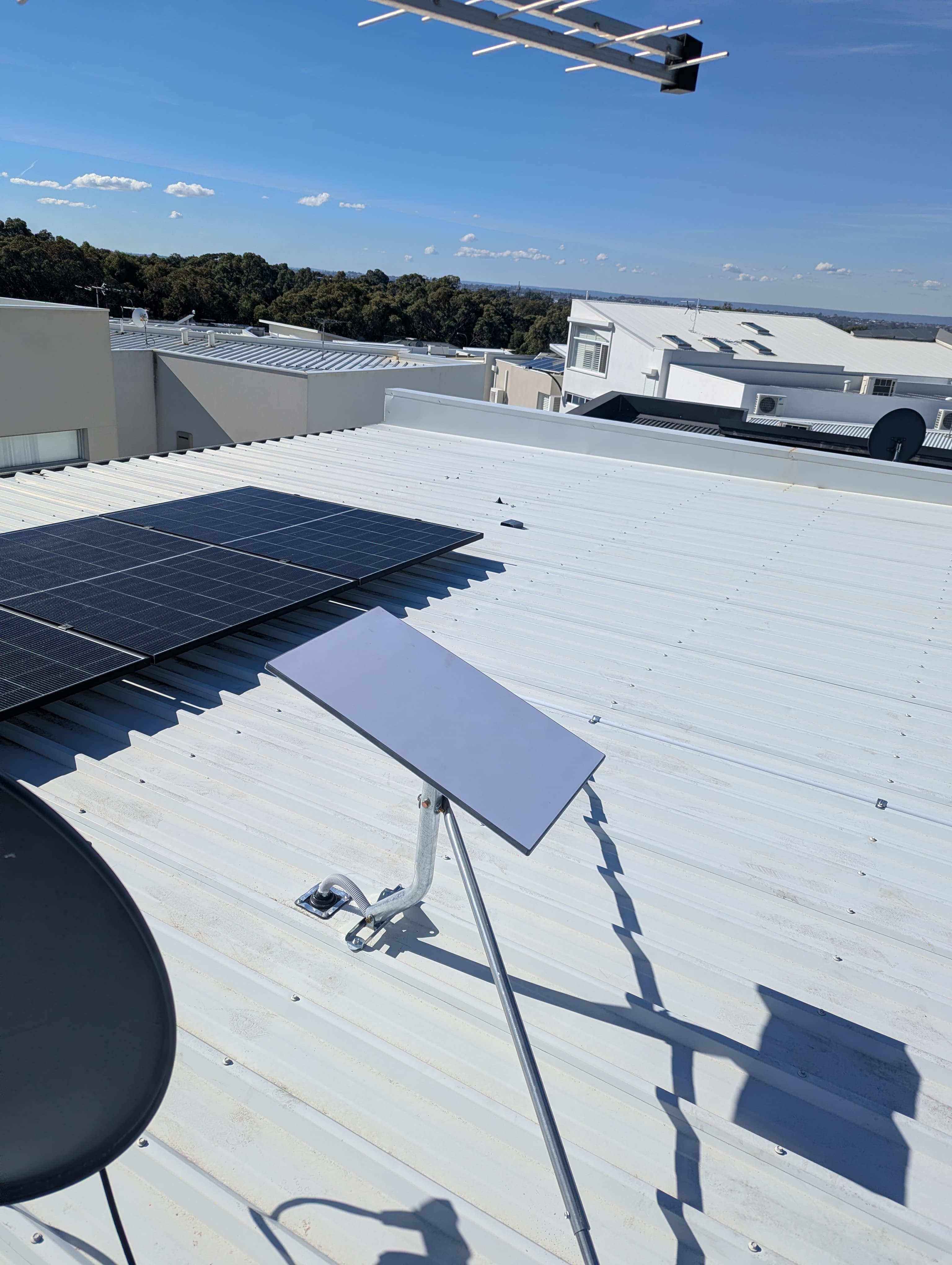 Starlink Gen 3 dish mounted on a two-storey City Beach roof