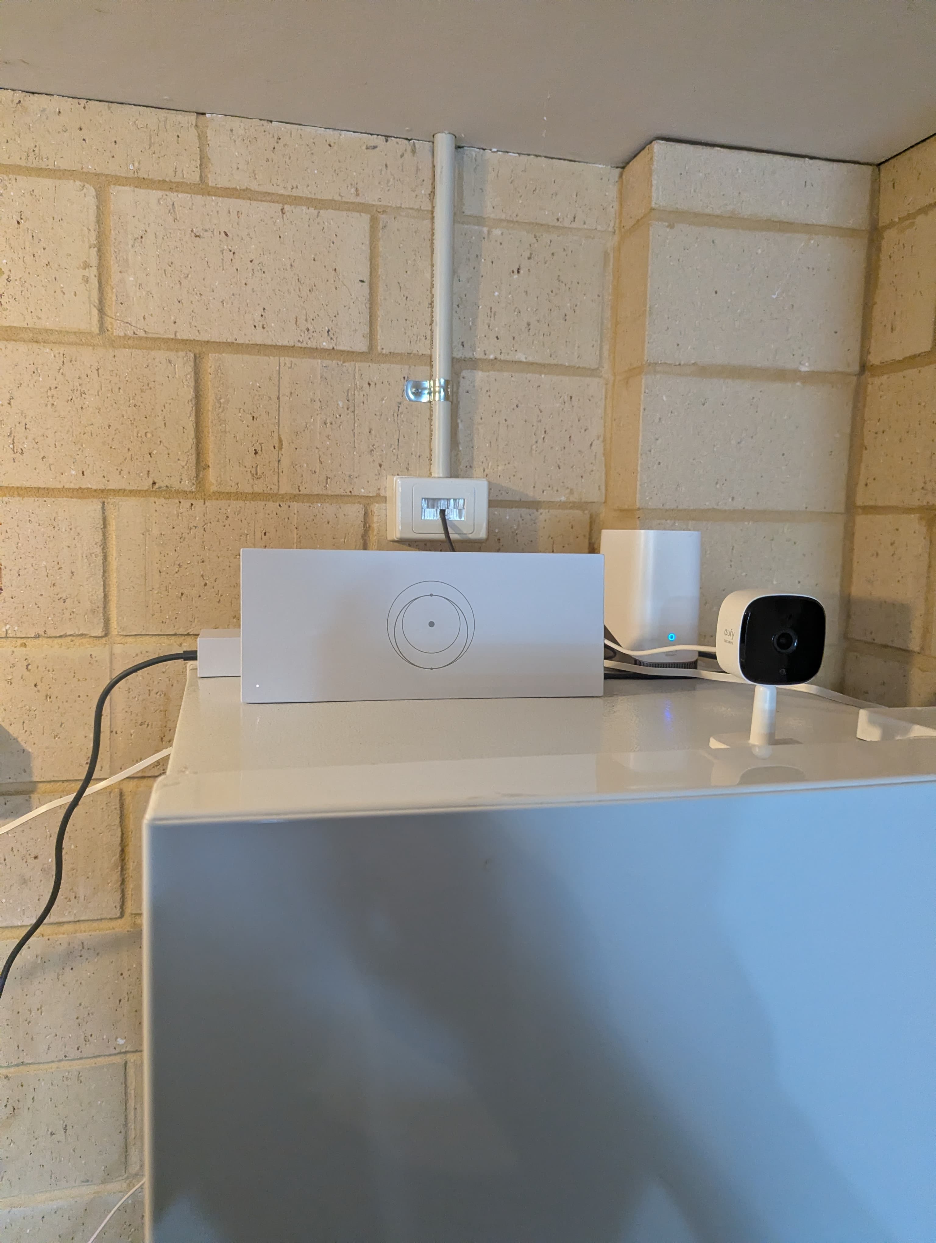 A man cave setup with Starlink Wi-Fi router
