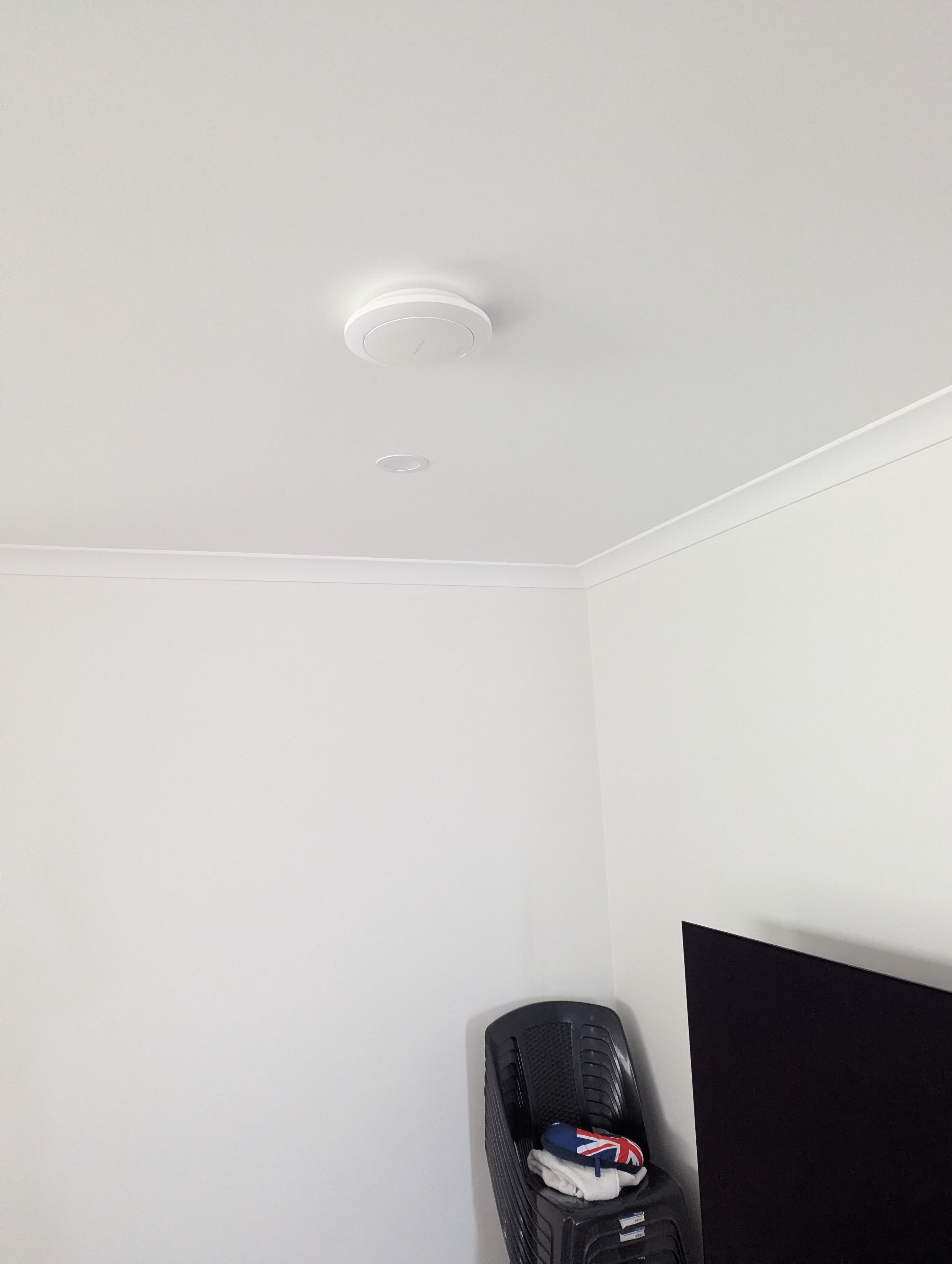 Discreet wall-mounted Wi-Fi access point installed by Blake Smart Solutions