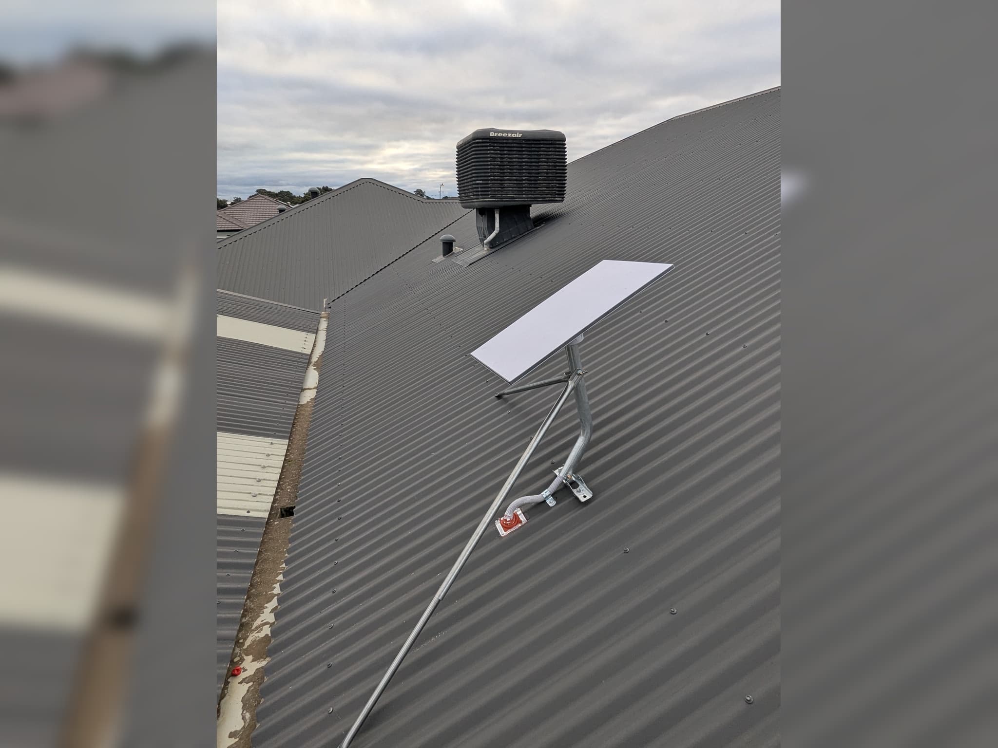 Starlink dish roof installation with conduit and sealed entry in Baldivis