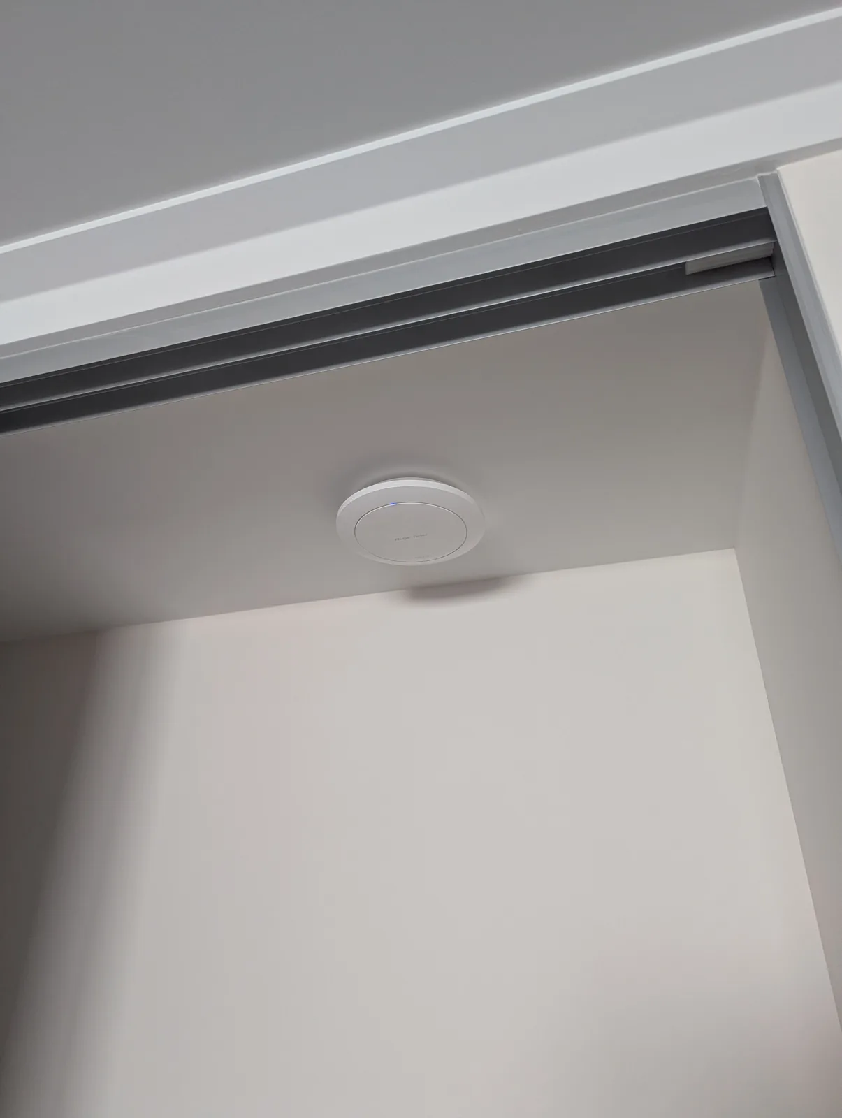 Ceiling-mounted Wi-Fi access point forming part of a complete home network in Attadale